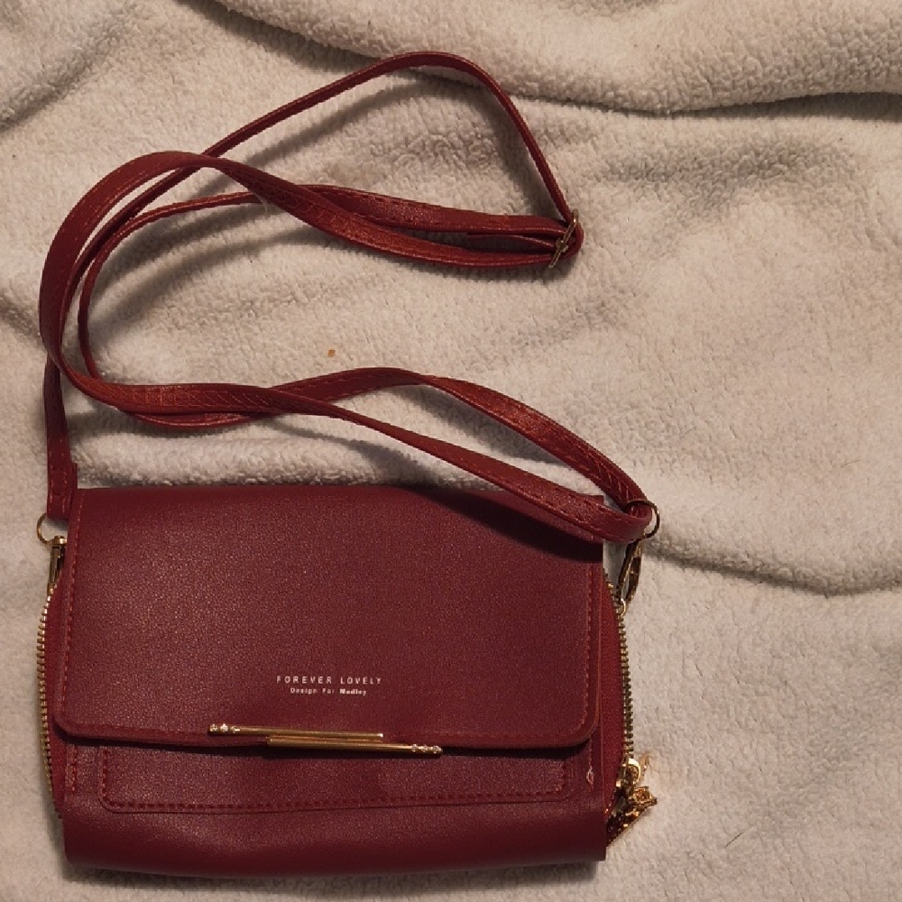Red Crossbody Bag.Strap Can Be Taken Up.It Has Gold Trim And Lots Of Compartment